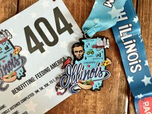 Race Through Illinois 1M, 5K, 10K, 13.1, 26.2 – Now Only $20! logo
