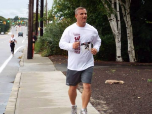 George Nasuti Novans Pride 5k logo
