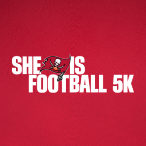 She is Football 5K Run, Walk & Stroll logo