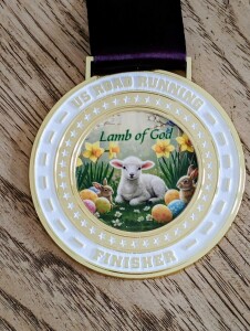 Lamb of God Virtual 5K, 10K, 13.1M, & 26.2M (April 2026) logo