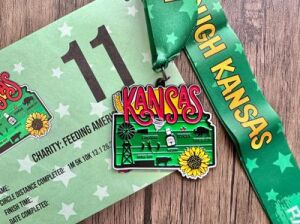 Race Through Kansas 1M, 5K, 10K, 13.1, 26.2 - Now Only $20! logo